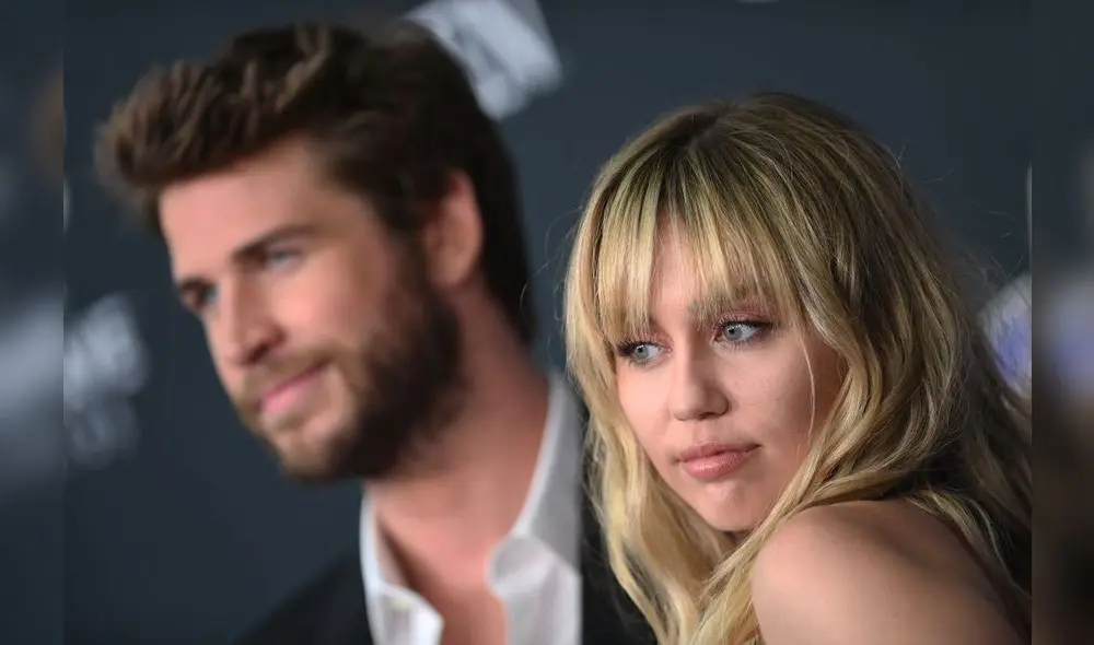 US singer Miley Cyrus and Australian actor Liam Hemsworth arrive for the World premiere of Marvel Studios' "Avengers: Endgame" at the Los Angeles Convention Center on April 22, 2019 in Los Angeles. (Photo by VALERIE MACON / AFP)        (Photo credit should read VALERIE MACON/AFP/Getty Images)