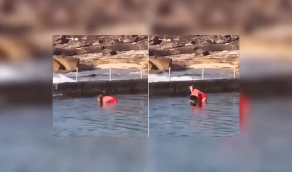 YouTube: Valiente mujer cargó un tiburón en el mar para salvar a su madre [VIDEO]