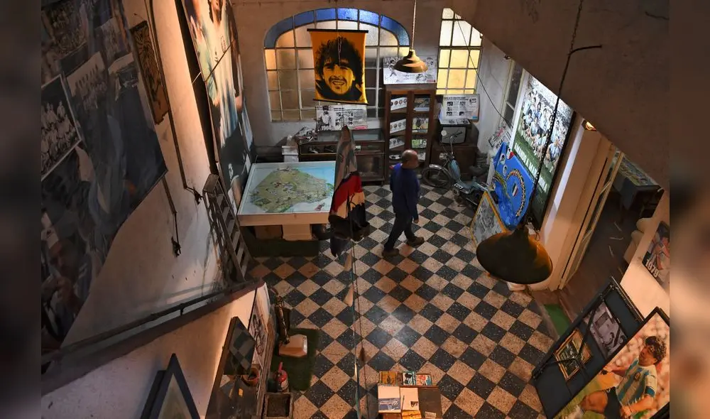 Memorabilia objects are displayed at the 'Casa de Dios' (House of God) museum in Buenos Aires, on June 27, 2018. - 'Casa de Dios' is located at the house where Argentine football star Diego Maradona used to live (1978 - 1980) when he played for Argentinos Juniors in La Paternal neighborhood. (Photo by EITAN ABRAMOVICH / AFP) Memorabilia objects are displayed at the 'Casa de Dios' (House of God) museum in Buenos Aires, on June 27, 2018. - 'Casa de Dios' is located at the house where Argentine football star Diego Maradona used to live (1978 - 1980) when he played for Argentinos Juniors in La Paternal neighborhood. (Photo by EITAN ABRAMOVICH / AFP)