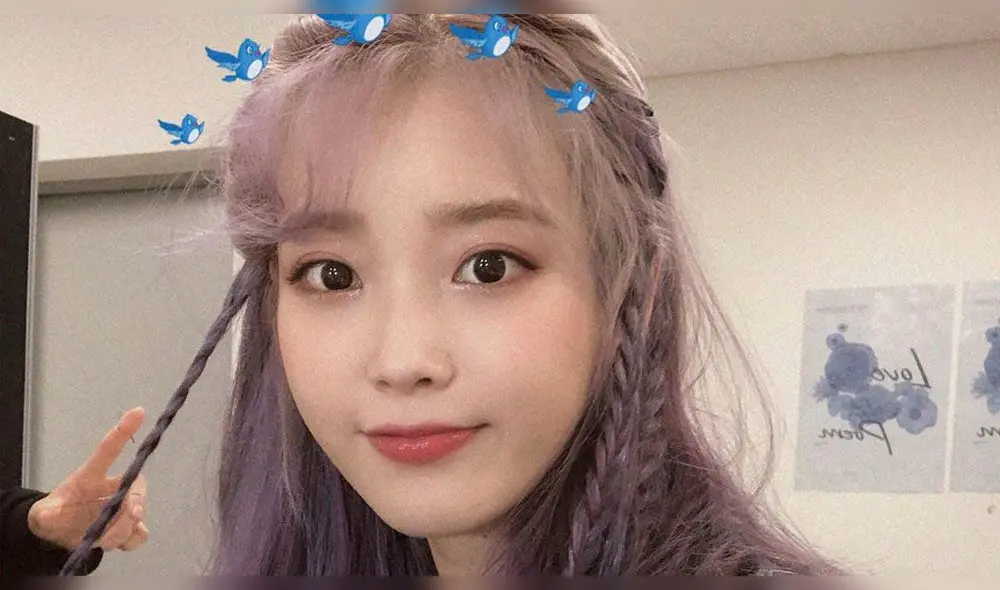 Desliza para ver más fotos de IU.