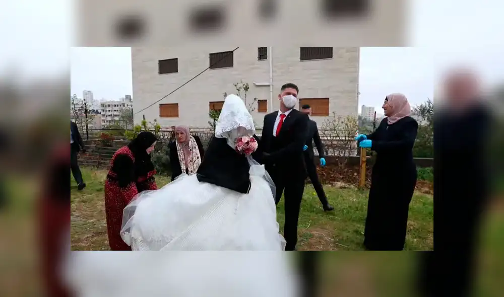 Cisjordania: novios celebran su boda enmascarados pese a restricciones por el coronavirus [VIDEO]