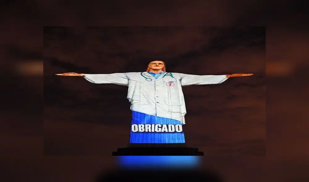 "Gracias" en portugués se leyó en el Cristo de Río para agradecer a los empleados que diariamente se encargan de pacientes con COVID-19. Foto: AFP "Gracias" en portugués se leyó en el Cristo de Río para agradecer a los empleados que diariamente se encargan de pacientes con COVID-19. Foto: AFP