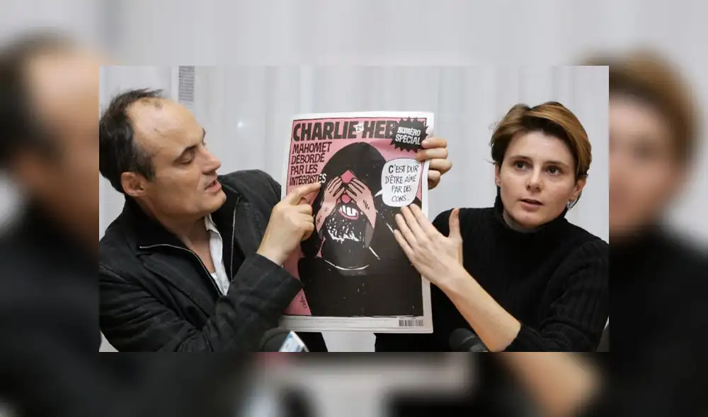 El editor jefe del semanario satírico francés Charlie Hebdo Philippe Val (L) y la periodista Caroline Fourest dan una conferencia de prensa, el 6 de febrero de 2007 en París. El editor jefe del semanario satírico francés Charlie Hebdo Philippe Val (L) y la periodista Caroline Fourest dan una conferencia de prensa, el 6 de febrero de 2007 en París.