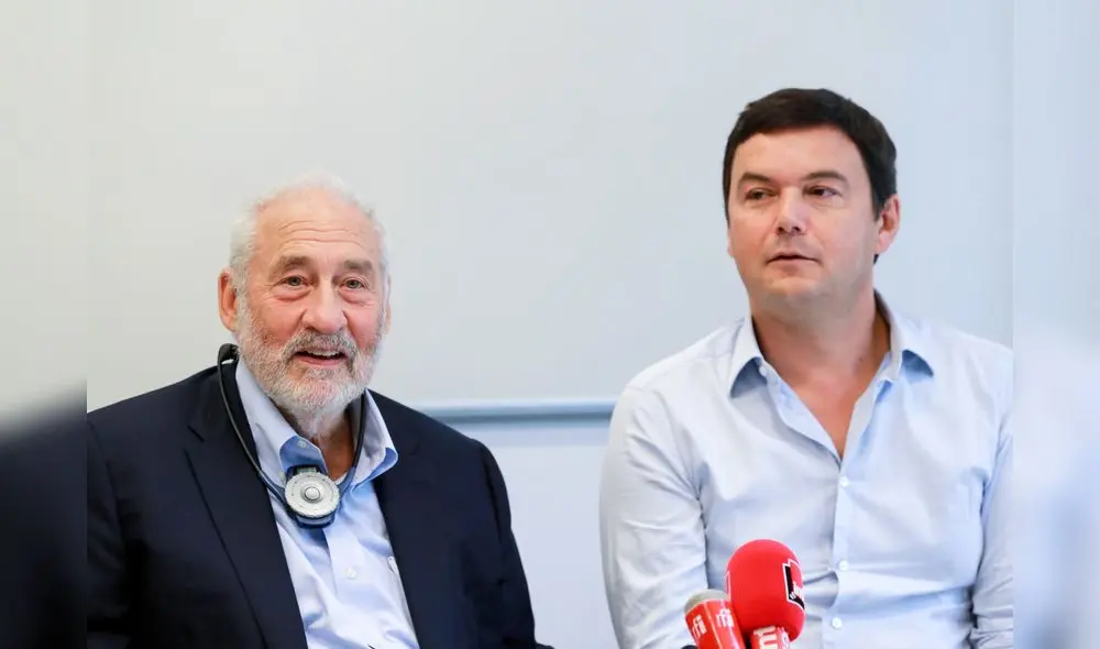 US economist Joseph Stiglitz (L) and with French economist Thomas Piketty attend a press conference on the theme "Taxes on multinational companies : a revolution for tomorrow ?", on September 19, 2019 in Paris. (Photo by JACQUES DEMARTHON / AFP) US economist Joseph Stiglitz (L) and with French economist Thomas Piketty attend a press conference on the theme "Taxes on multinational companies : a revolution for tomorrow ?", on September 19, 2019 in Paris. (Photo by JACQUES DEMARTHON / AFP)