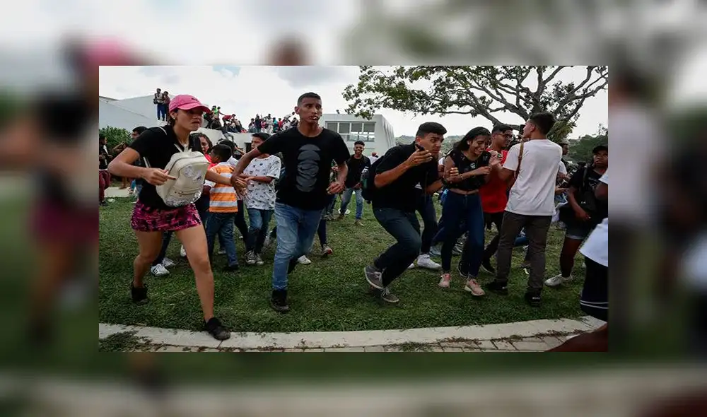 Varias personas corrieron durante los disturbios en el concierto de Neutro Shorty. Foto: EFE