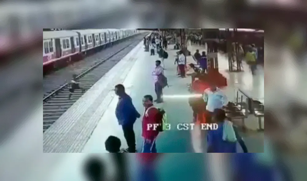 Joven cruza las vías del tren y queda a centímetros de morir aplastado [VIDEO]