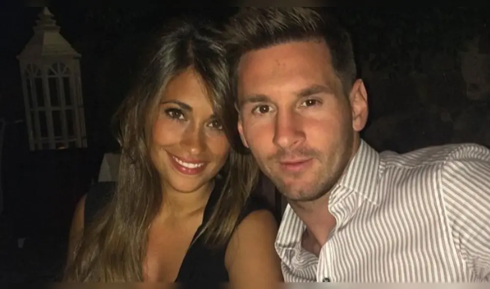 Intruso se oculta detrás de Antonella Rocuzzo ante la mirada de Lionel Messi Intruso se oculta detrás de Antonella Rocuzzo ante la mirada de Lionel Messi