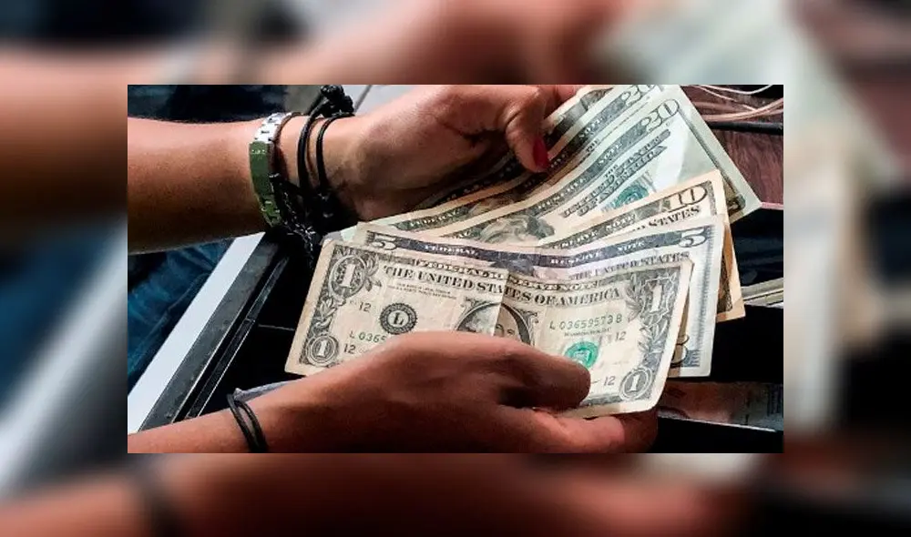 Dólar en Venezuela. Foto: AFP. Dólar en Venezuela. Foto: AFP.