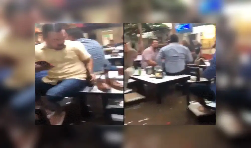 Clientes continúan bebiendo, pese a que bar es inundado por lluvia torrencial [VIDEO]