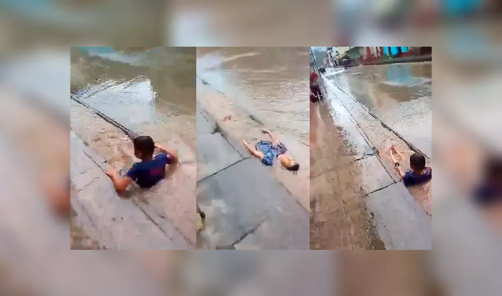 Video es viral en Facebook. Las lluvias son tan fuertes en Chanchamayo que un pequeño fue grabado jugando con el agua que formó una especie de tobogán en las calles. Foto: Captura.