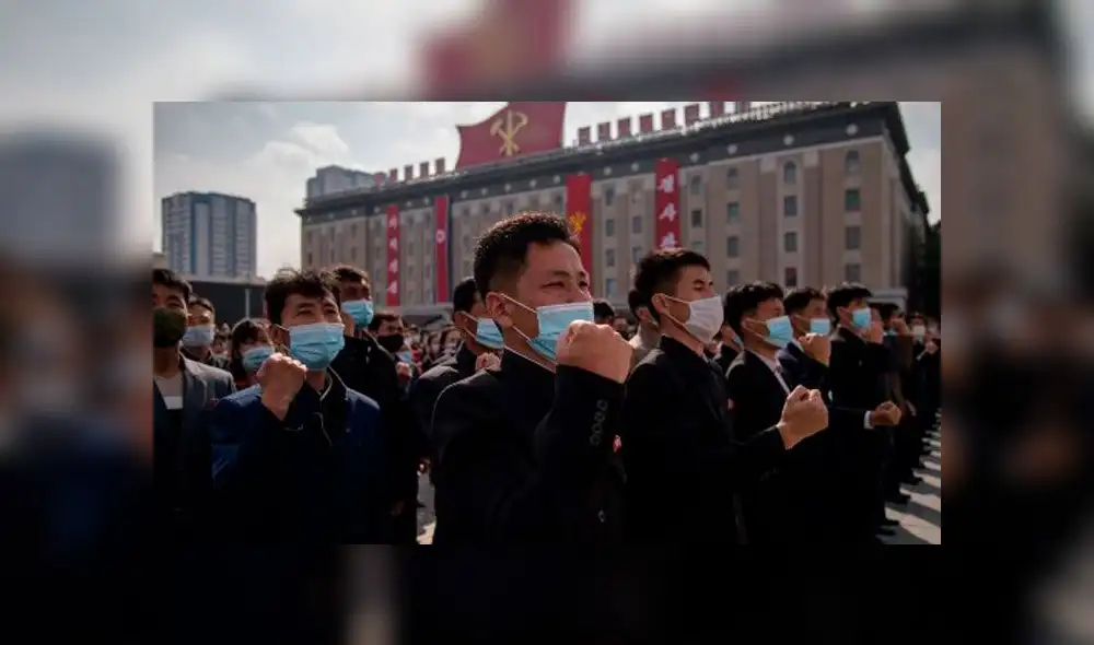Los participantes con máscaras faciales asisten a una manifestación que marca el inicio de una 'Campaña de 80 días'. Foto: AFP Los participantes con máscaras faciales asisten a una manifestación que marca el inicio de una 'Campaña de 80 días'. Foto: AFP