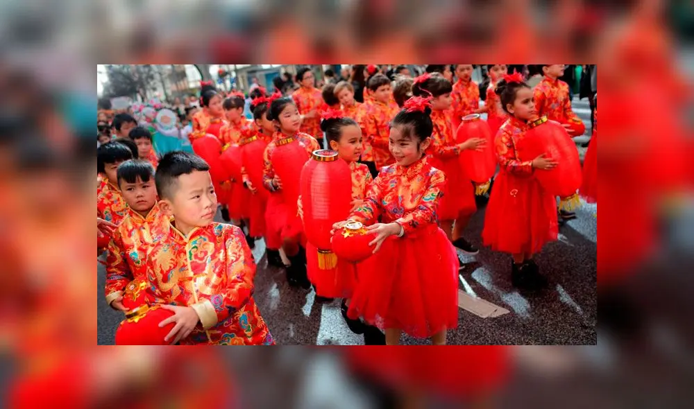 Niños festejando el año nuevo de la rata en Lisboa, Portugal. Foto: AP Niños festejando el año nuevo de la rata en Lisboa, Portugal. Foto: AP