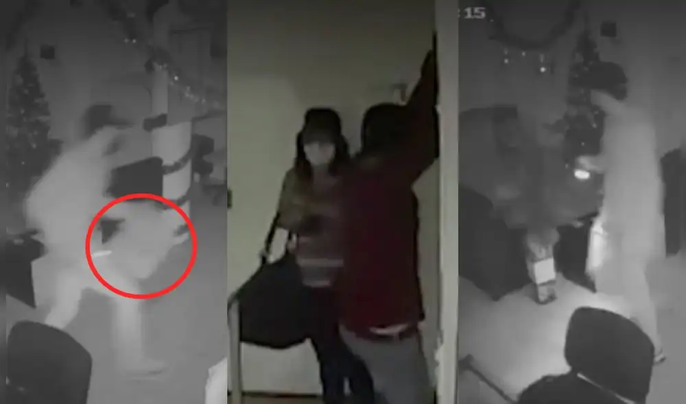 La pareja fue captada llevándose dos laptops de alta gama. Foto: captura de América TV