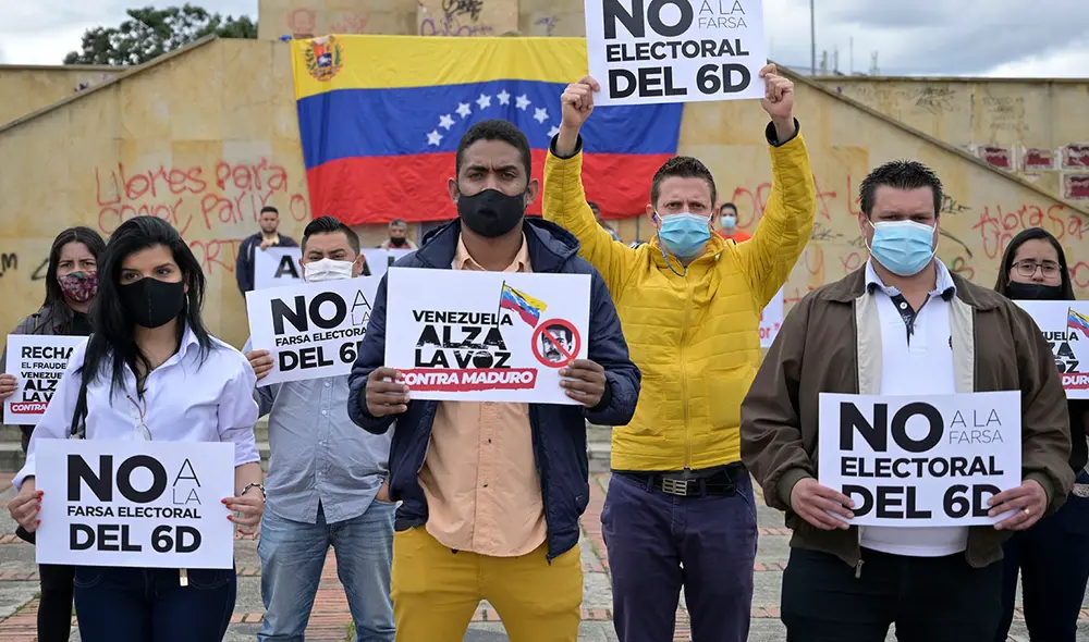 Venezolanos por el mundo se expresan en rechazo a las Elecciones Parlamentarias en el país sudamericano. Foto: AFP. Venezolanos por el mundo se expresan en rechazo a las Elecciones Parlamentarias en el país sudamericano. Foto: AFP.