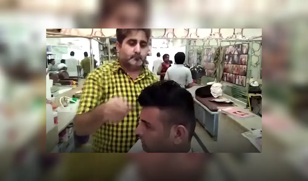 YouTube: Peluquero corta el cabello con 15 tijeras a la misma vez [VIDEO]