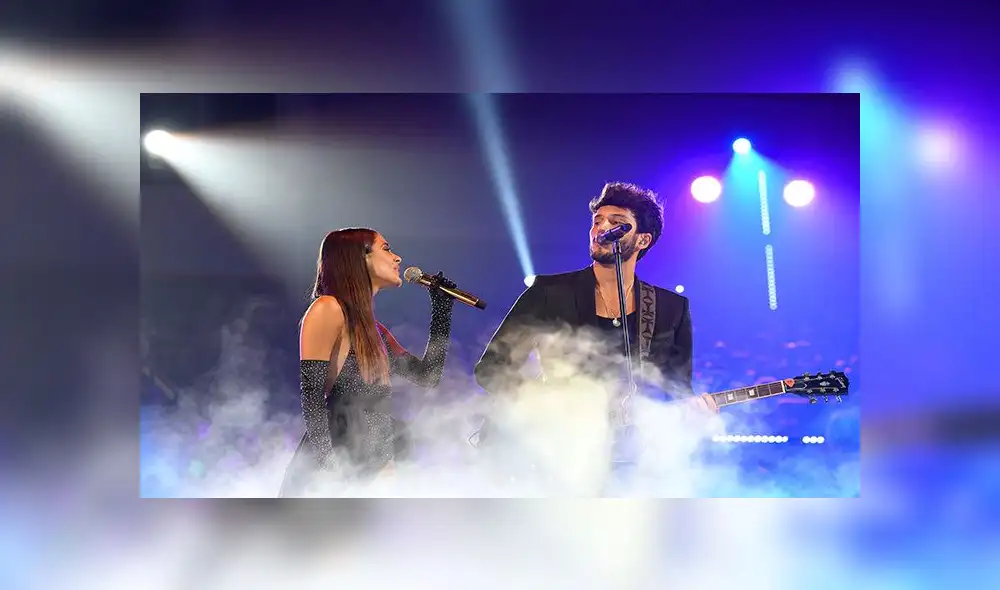 CORAL GABLES, FLORIDA - JULY 18: Tini and Sebastian Yatra perform on stage during Premios Juventud 2019 at Watsco Center on July 18, 2019 in Coral Gables, Florida.   Jason Koerner/Getty Images/AFP
