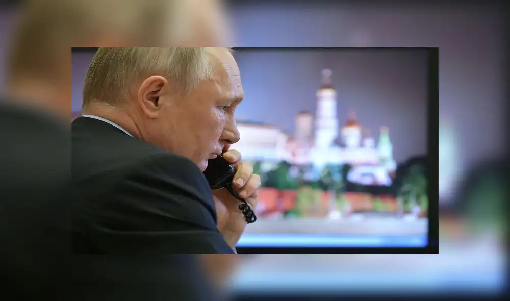 Russian President Vladimir Putin attends a meeting on the situation with the spread of the COVID-19 coronavirus disease in Russia, via a teleconference call at the Novo-Ogaryovo state residence outside Moscow on April 13, 2020. (Photo by Alexey DRUZHININ / SPUTNIK / AFP) Russian President Vladimir Putin attends a meeting on the situation with the spread of the COVID-19 coronavirus disease in Russia, via a teleconference call at the Novo-Ogaryovo state residence outside Moscow on April 13, 2020. (Photo by Alexey DRUZHININ / SPUTNIK / AFP)