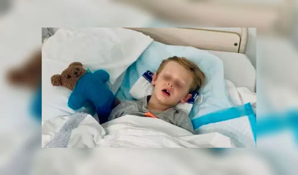 Padre golpea cabeza de serpiente de 4 metros para salvar a su hijo de la muerte [FOTO] 