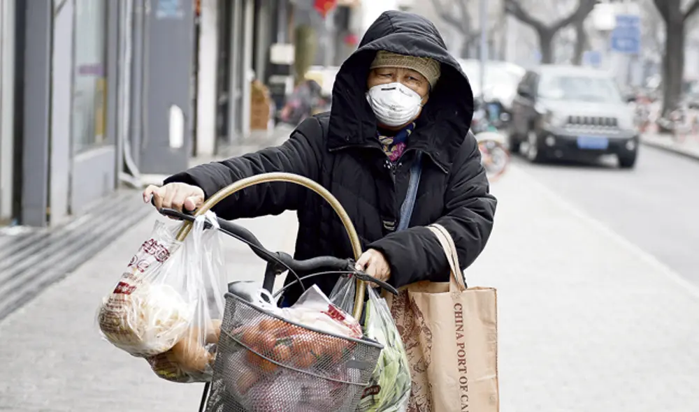 Recluidos. Cada dos días, los pobladores están autorizados a salir de sus casas. (Foto: AFP) Recluidos. Cada dos días, los pobladores están autorizados a salir de sus casas. (Foto: AFP)