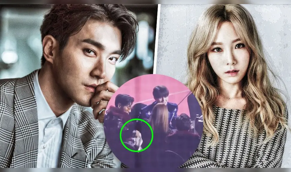 Siwon demuestra su caballerosidad con Kim Taeyeon durante la premiación de los Seoul Music Awards Siwon demuestra su caballerosidad con Kim Taeyeon durante la premiación de los Seoul Music Awards