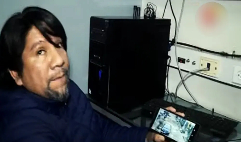 Vecinos vigilan desde sus teléfonos móviles. Foto: Captura.