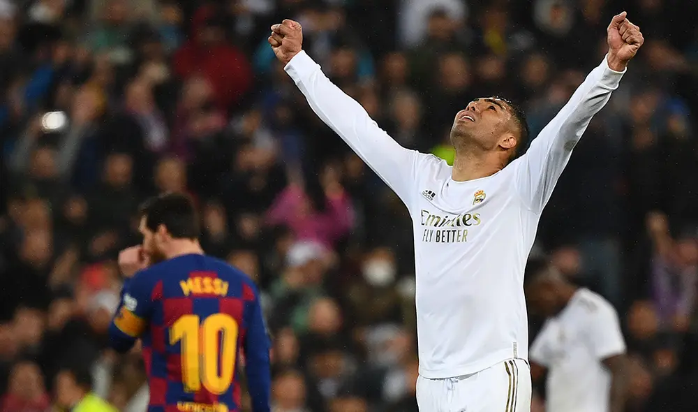 Casemiro celebrando el gran triunfo del Real Madrid y atrás la desazón de Lionel Messi. | Foto: EFE Casemiro celebrando el gran triunfo del Real Madrid y atrás la desazón de Lionel Messi. | Foto: EFE