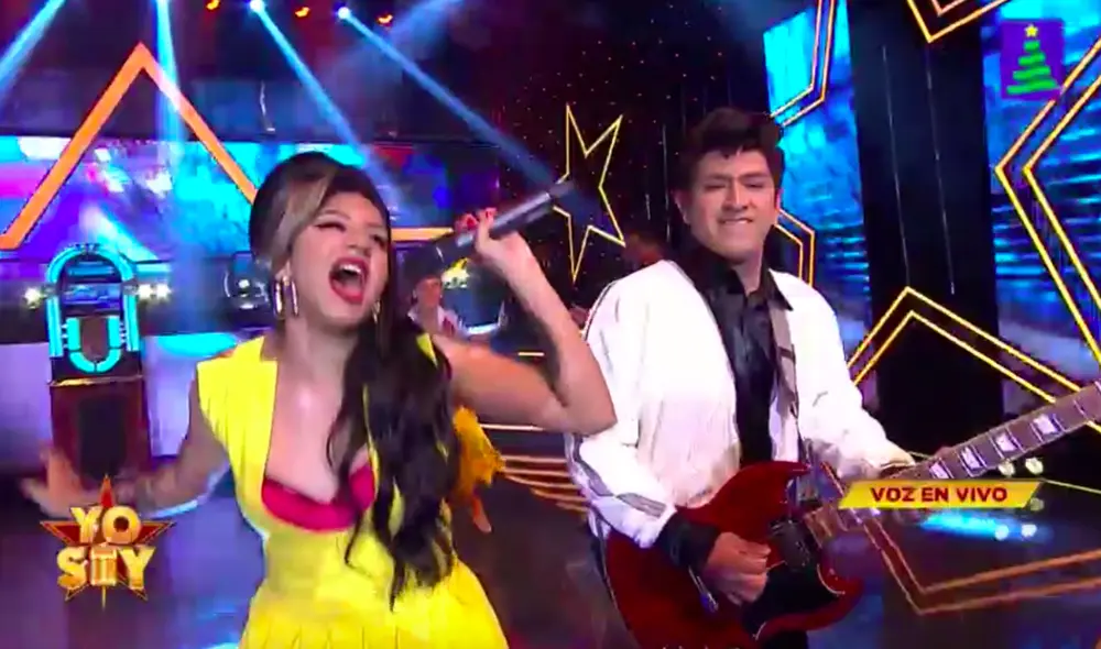 Con una colorida temática y ostentosos vestuarios, el imitador y Any Rodríguez lograron esbozar sonrisas en los rostros Ricardo Morán y Johanna San Miguel. Foto: captura Latina