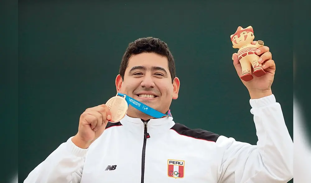 Lima, Thursday August 01, 2019  - Marko Carrillo from Peru shows his bronze medal in the men´s 25m gun category at Base Las Palmas during the Pan American Games Lima 2019.

Copyright Juan Carlos Guzman / Lima 2019

Mandatory credits: Lima 2019
** NO SALES ** NO ARCHIVES **