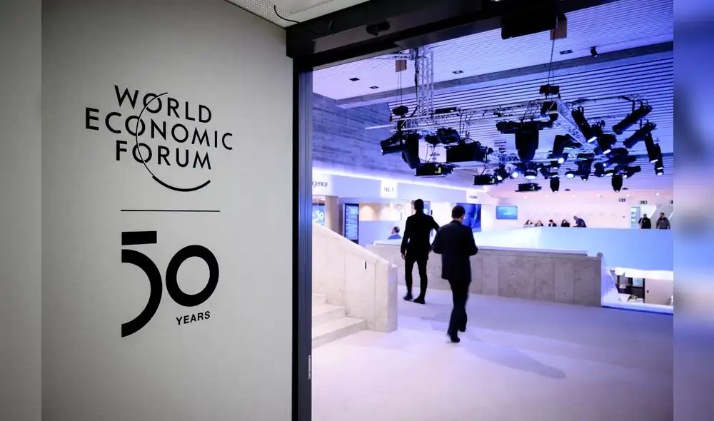 A sign of the World Economic Forum (WEF) is seen at the Congress center ahead of the WEF's annual meeting in Davos, on January 19, 2020. (Photo by Fabrice COFFRINI / AFP)
