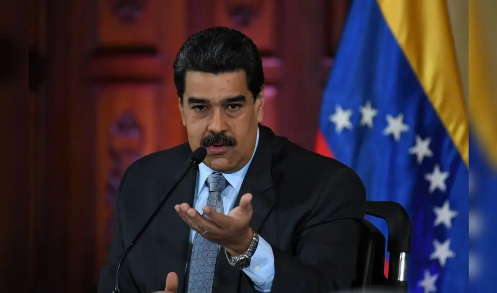 Maduro y Guaidó se pronuncian sobre actos xenófobos en Perú. Foto: AFP. Maduro y Guaidó se pronuncian sobre actos xenófobos en Perú. Foto: AFP.