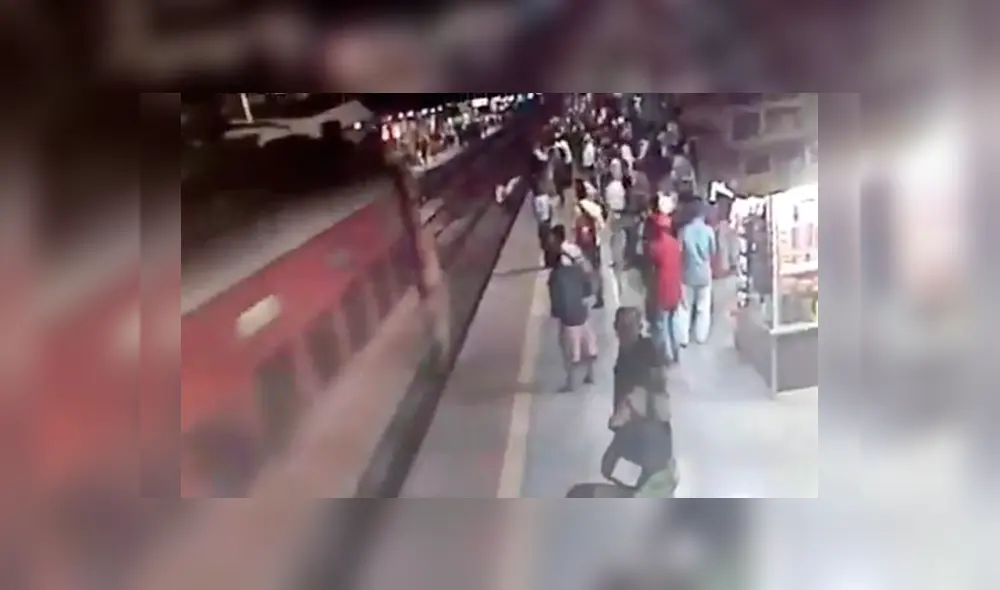 Policía arriesga su vida para salvar a distraído sujeto de un tren a toda velocidad [VIDEO]