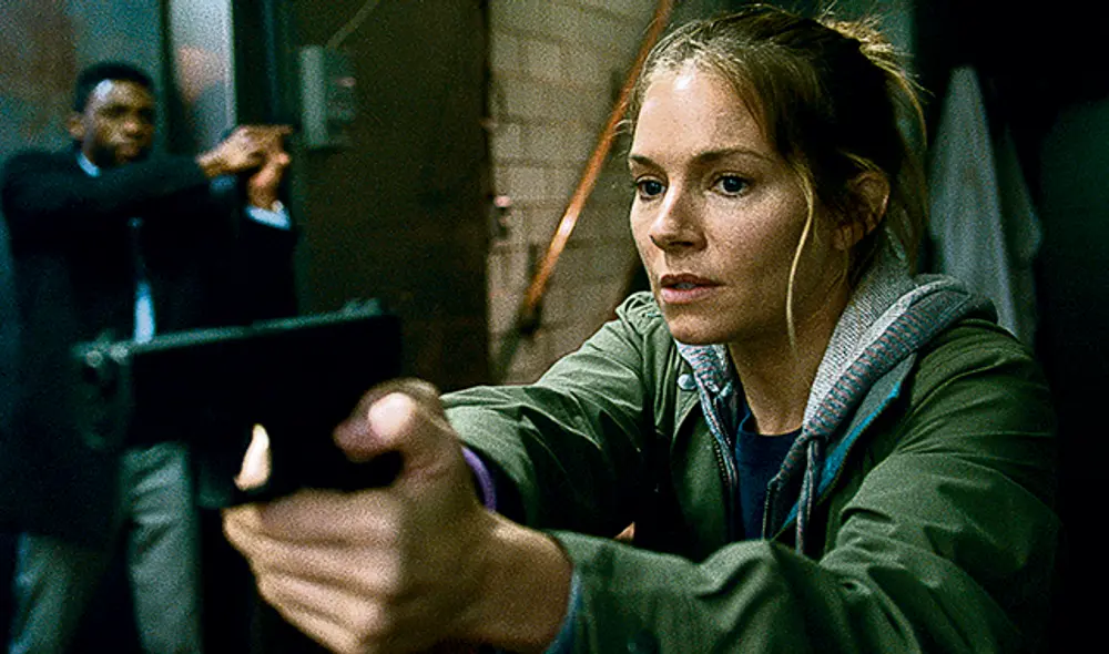 Escena. Miller como la detective ‘Frankie Burns’.