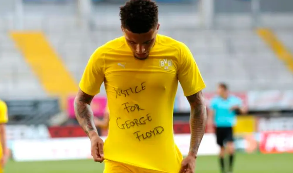 Jadon Sancho exige justicia por el asesinato de estadounidense George Floyd tras anotar con el Borussia Dortmund. (FOTO: AFP).