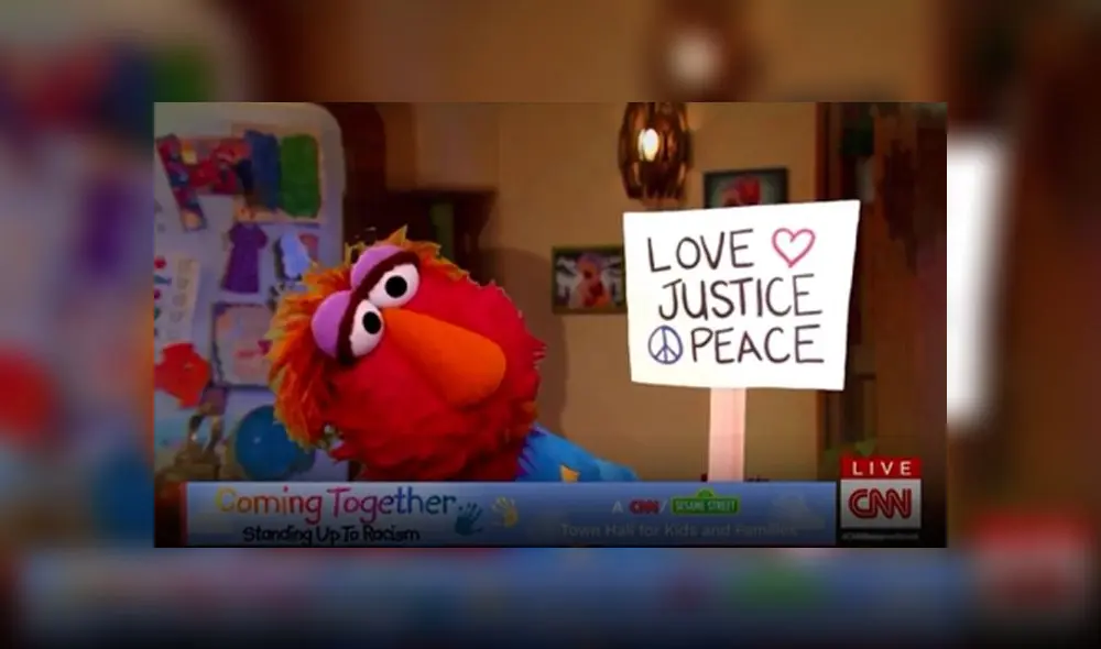 El papá de Elmo, Louie, le enseñó cómo se desarrolla una protesta. (Foto: CNN) El papá de Elmo, Louie, le enseñó cómo se desarrolla una protesta. (Foto: CNN)
