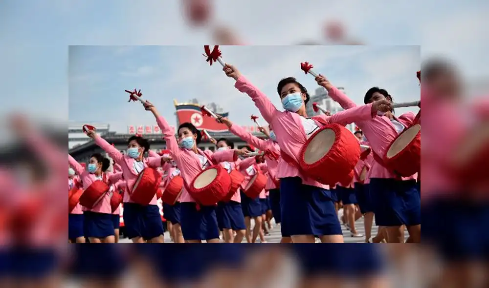 Mujeres bailan en la marcha en apoyo al Gobierno de Kim Jon-un. Foto: AFP Mujeres bailan en la marcha en apoyo al Gobierno de Kim Jon-un. Foto: AFP