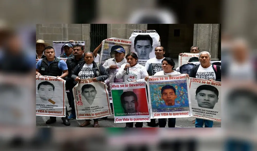 Relatives of the 43 missing students of the Ayotzinapa Rural Teachers' College speak during a press conference at Palacio Nacional, after a meeting with Mexican President Andres Manuel Lopez Obrador, in Mexico City, on March 5, 2020. (Photo by ALFREDO ESTRELLA / AFP)