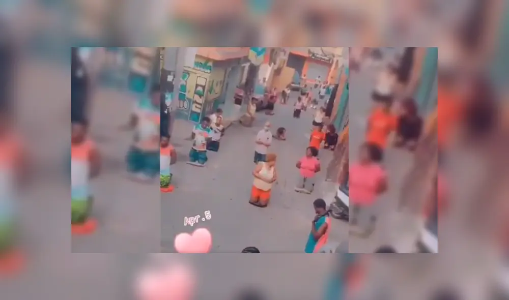 Vecinos en República Dominicana oraron por los pacientes con COVID-19. Foto: captura video.