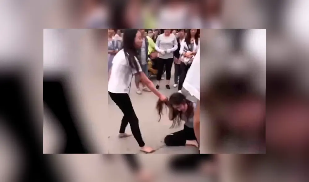 YouTube: golpea a la amante de su pareja en la calle y él la defiende [VIDEO]