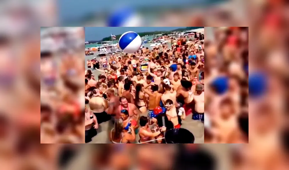 Cientos de personas abarrotaron el lago Diamond en Michigan sin mantener la distancia ni el uso de mascarillas. (Foto: MLive) Cientos de personas abarrotaron el lago Diamond en Michigan sin mantener la distancia ni el uso de mascarillas. (Foto: MLive)