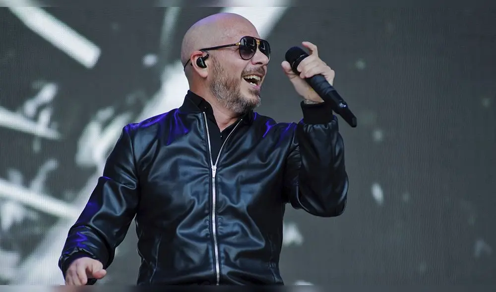 John Travolta irreconocible en “3 to Tango”, lo nuevo de Pitbull en YouTube