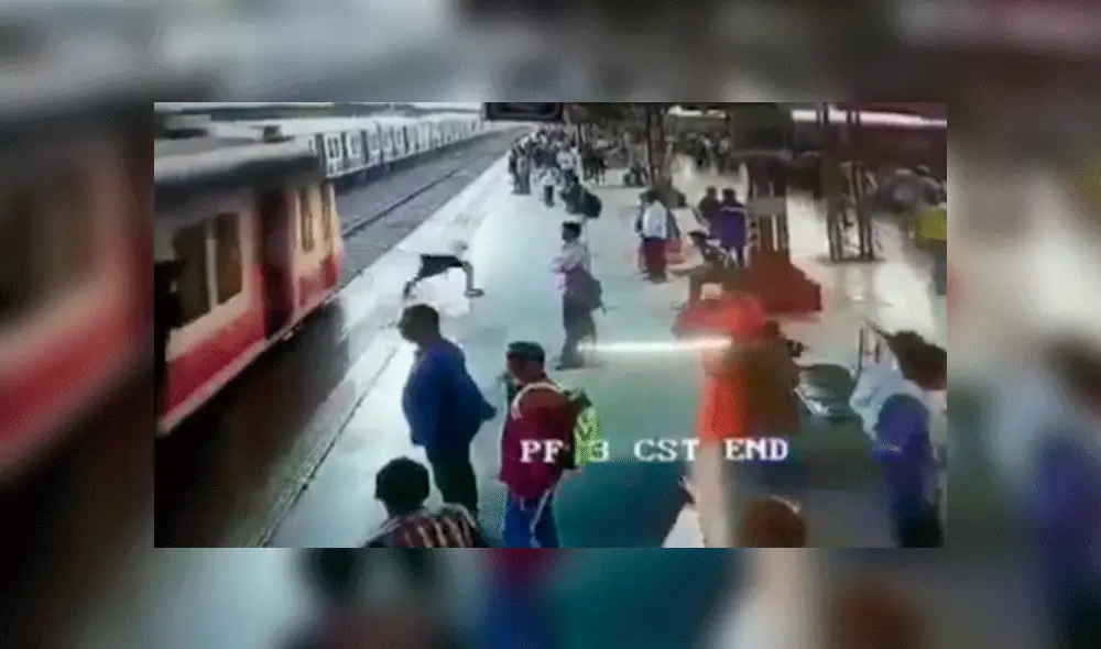 Joven cruza las vías del tren y queda a centímetros de morir aplastado [VIDEO]