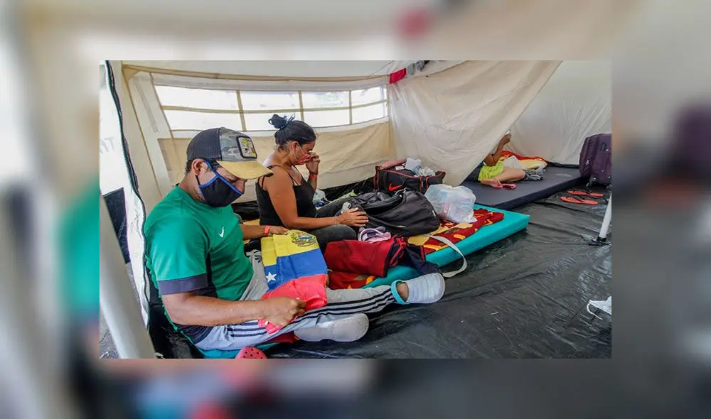 Migrantes venezolanos en carpas instaladas en Colombia mientras esperan la oportunidad de poder regresar a Venezuela, en medio de la pandemia del coronavirus. Foto: AFP