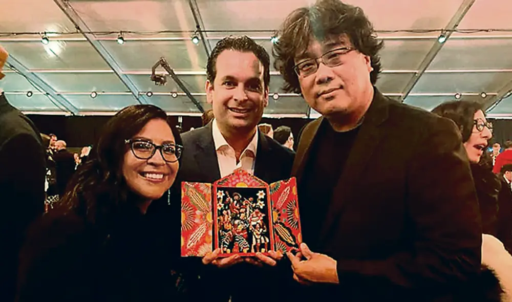 Postal. Campos, Delgado Aparicio y el nominado al Óscar.