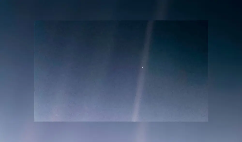 La fotografía remasterizada del famoso 'Punto azul pálido' captado por la sonda Voyager-1. Crédito: NASA. La fotografía remasterizada del famoso 'Punto azul pálido' captado por la sonda Voyager-1. Crédito: NASA.