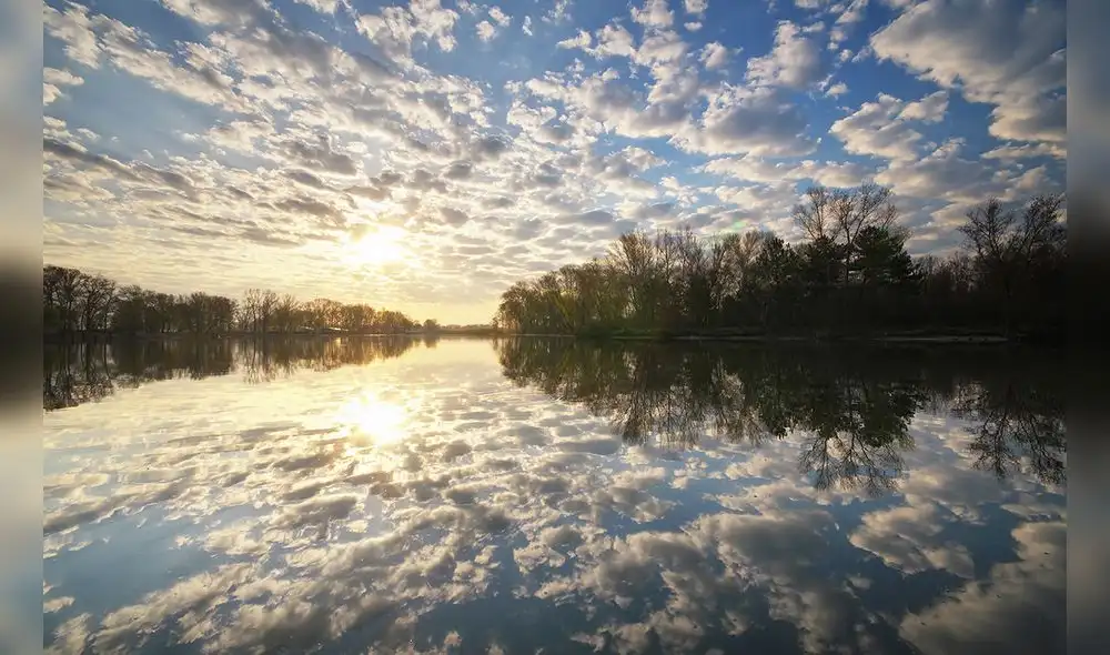 Morning water reflection on river. Nature composition.