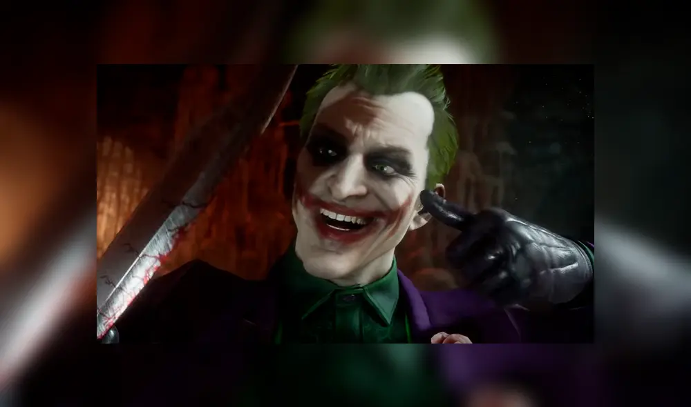 Joker haciéndose su sonrisa con su propia sangre. Joker haciéndose su sonrisa con su propia sangre.
