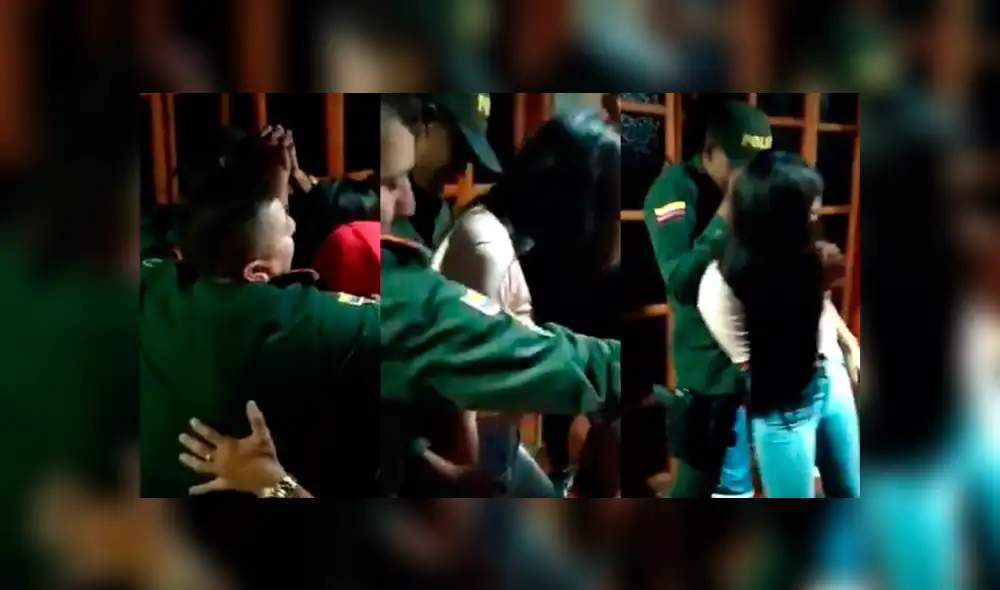 Dos policías y un grupo de jóvenes fueron los protagonistas de un irresponsable acto en pleno estado de emergencia por la COVID-19. Foto: Captura / Twitter Dos policías y un grupo de jóvenes fueron los protagonistas de un irresponsable acto en pleno estado de emergencia por la COVID-19. Foto: Captura / Twitter