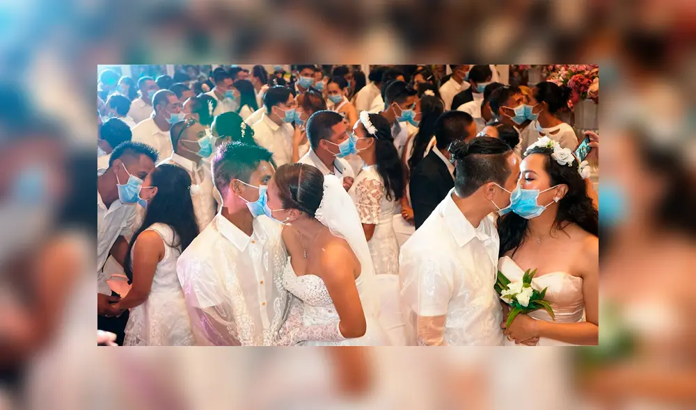 220 parejas con la mascarilla puesta se casaron en la ciudad filipina de Bacolod en febrero de 2020. Foto: Captura / rtve 220 parejas con la mascarilla puesta se casaron en la ciudad filipina de Bacolod en febrero de 2020. Foto: Captura / rtve