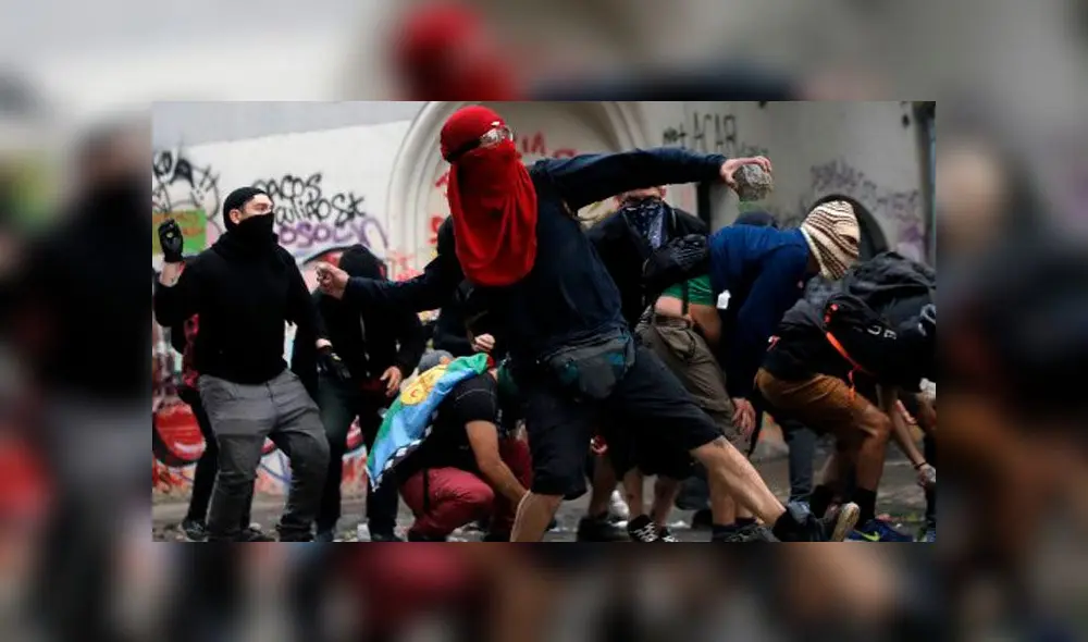 Ciudadanos protestan contra Sebastián Piñera. Foto: AFP.