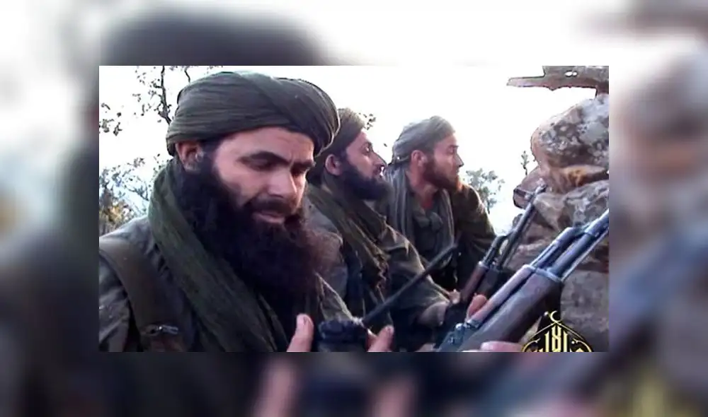 (FILES) In this undated handout file photo released by Al-Andalus on May 23, 2012 shows Abdelmalek Droukdel, aka Abu Musab Abdul Wadud, a leader of Al-Qaeda in the Islamic Maghreb (AQIM), with his fighters in Azawad, an unrecognized state in northern Mali. - Al-Qaeda in the Islamic Maghreb (AQIM) chief Abdelmalek Droukdel was killed on June 5, 2020 in Mali. (Photo by - / Al-Andalus / AFP) / RESTRICTED TO EDITORIAL USE - MANDATORY CREDIT "AFP PHOTO/ AL-ANDALUS" - NO MARKETING - NO ADVERTISING CAMPAIGNS - DISTRIBUTED AS A SERVICE TO CLIENTS (FILES) In this undated handout file photo released by Al-Andalus on May 23, 2012 shows Abdelmalek Droukdel, aka Abu Musab Abdul Wadud, a leader of Al-Qaeda in the Islamic Maghreb (AQIM), with his fighters in Azawad, an unrecognized state in northern Mali. - Al-Qaeda in the Islamic Maghreb (AQIM) chief Abdelmalek Droukdel was killed on June 5, 2020 in Mali. (Photo by - / Al-Andalus / AFP) / RESTRICTED TO EDITORIAL USE - MANDATORY CREDIT "AFP PHOTO/ AL-ANDALUS" - NO MARKETING - NO ADVERTISING CAMPAIGNS - DISTRIBUTED AS A SERVICE TO CLIENTS